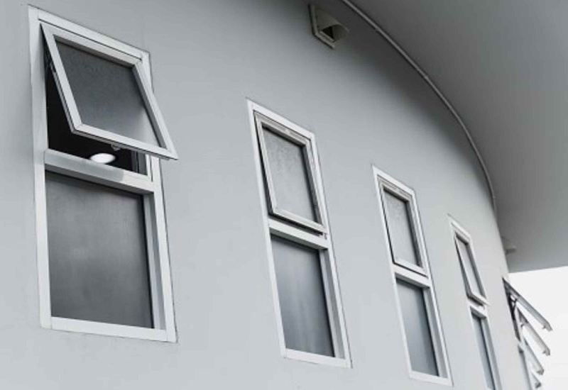 A line of awning windows on a circular building in Columbus, Ohio