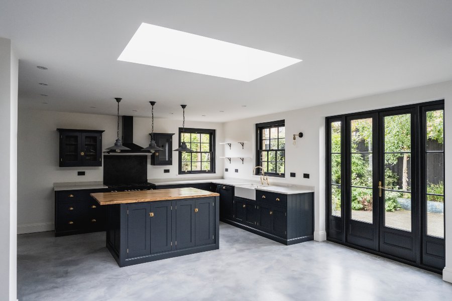 Modern kitchen with black framed French patio doors